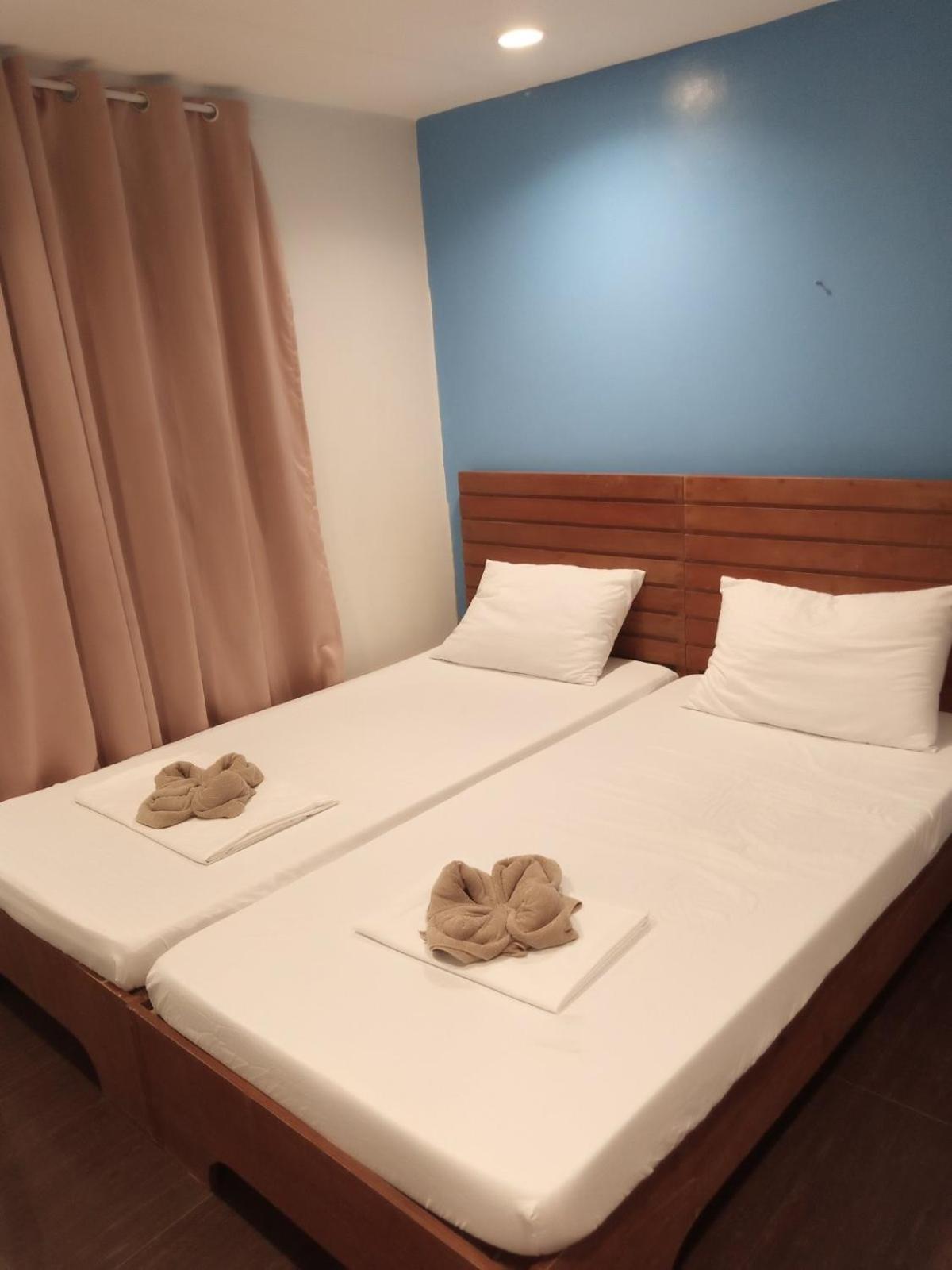 Amos Pili Tree Inn Powered By Cocotel Эль-Нидо Экстерьер фото