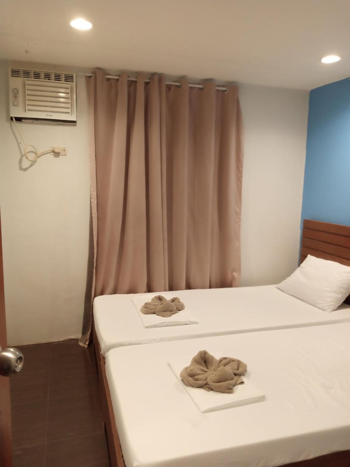 Amos Pili Tree Inn Powered By Cocotel Эль-Нидо Экстерьер фото