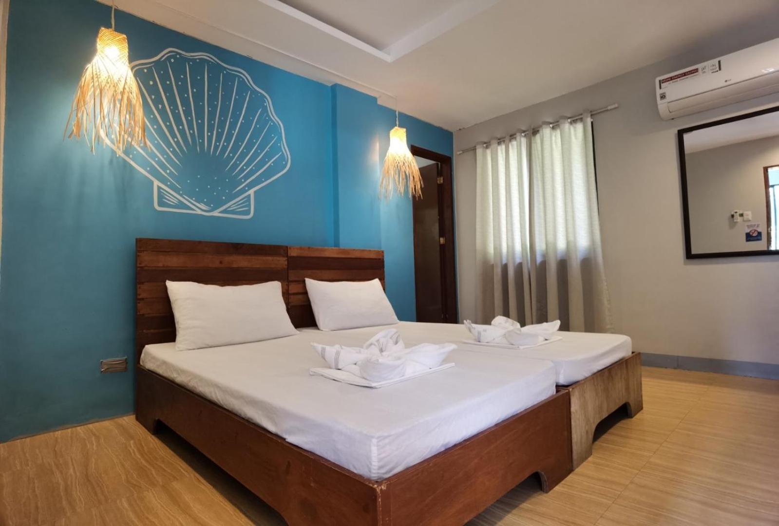 Amos Pili Tree Inn Powered By Cocotel Эль-Нидо Номер фото