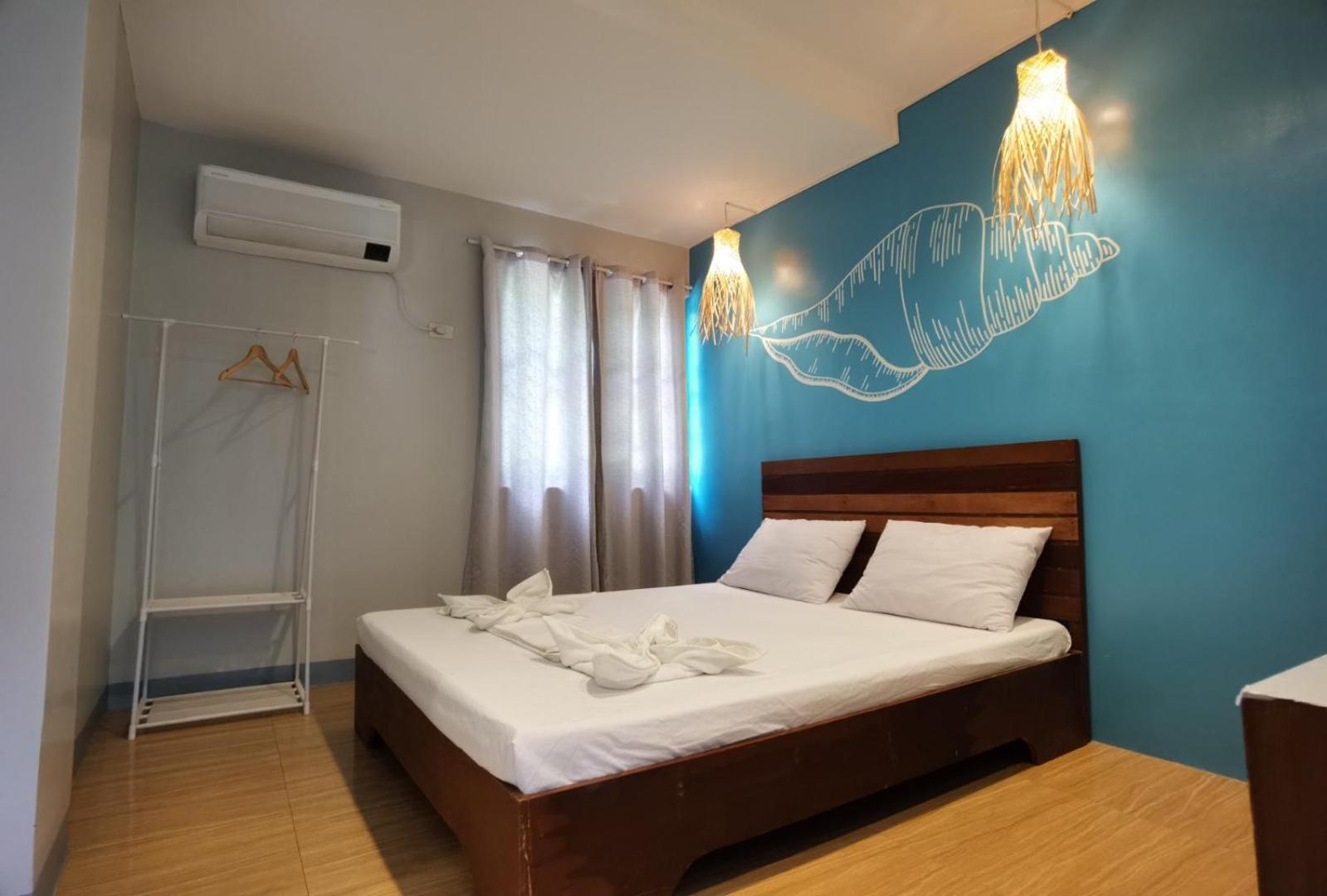 Amos Pili Tree Inn Powered By Cocotel Эль-Нидо Номер фото