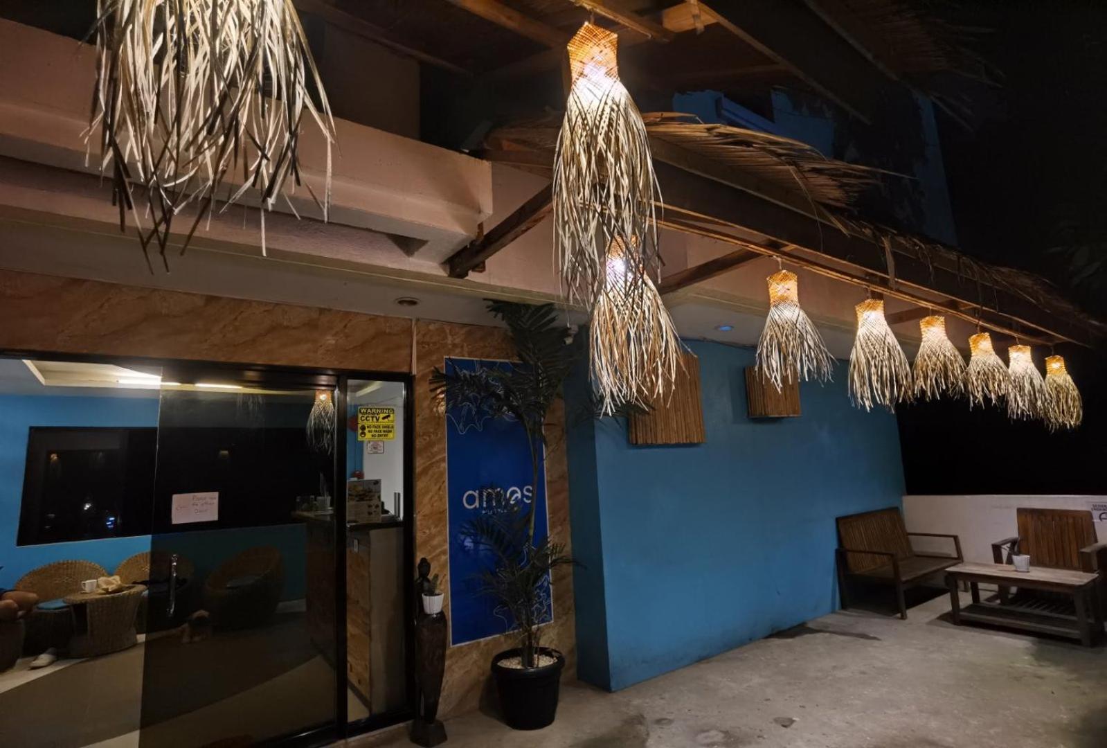 Amos Pili Tree Inn Powered By Cocotel Эль-Нидо Экстерьер фото