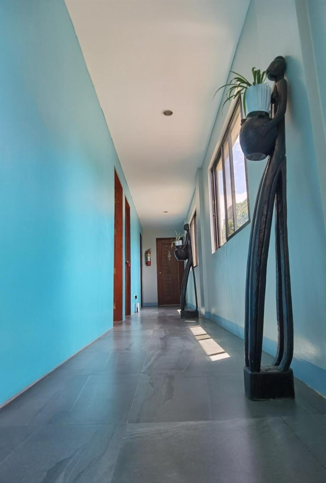 Amos Pili Tree Inn Powered By Cocotel Эль-Нидо Экстерьер фото
