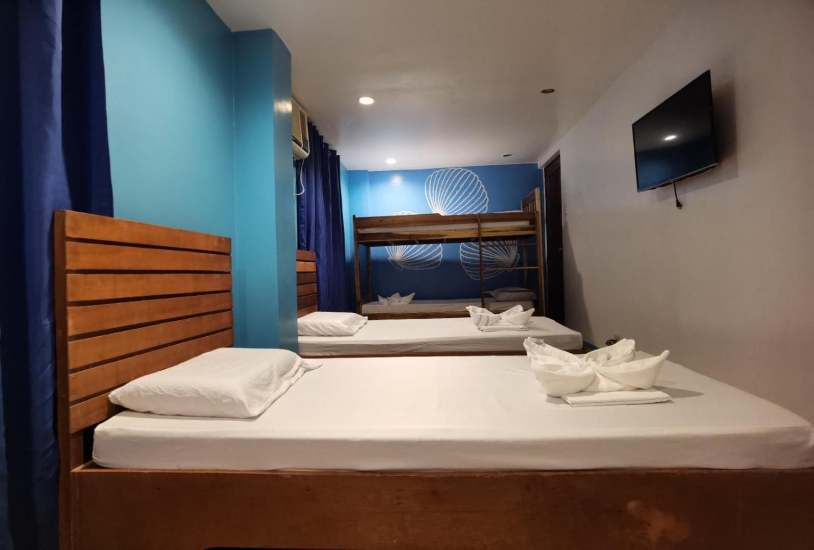 Amos Pili Tree Inn Powered By Cocotel Эль-Нидо Номер фото