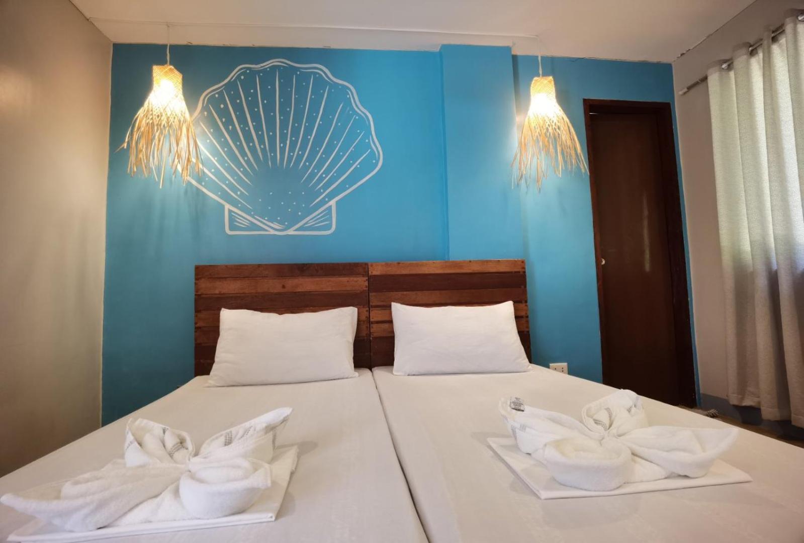 Amos Pili Tree Inn Powered By Cocotel Эль-Нидо Номер фото