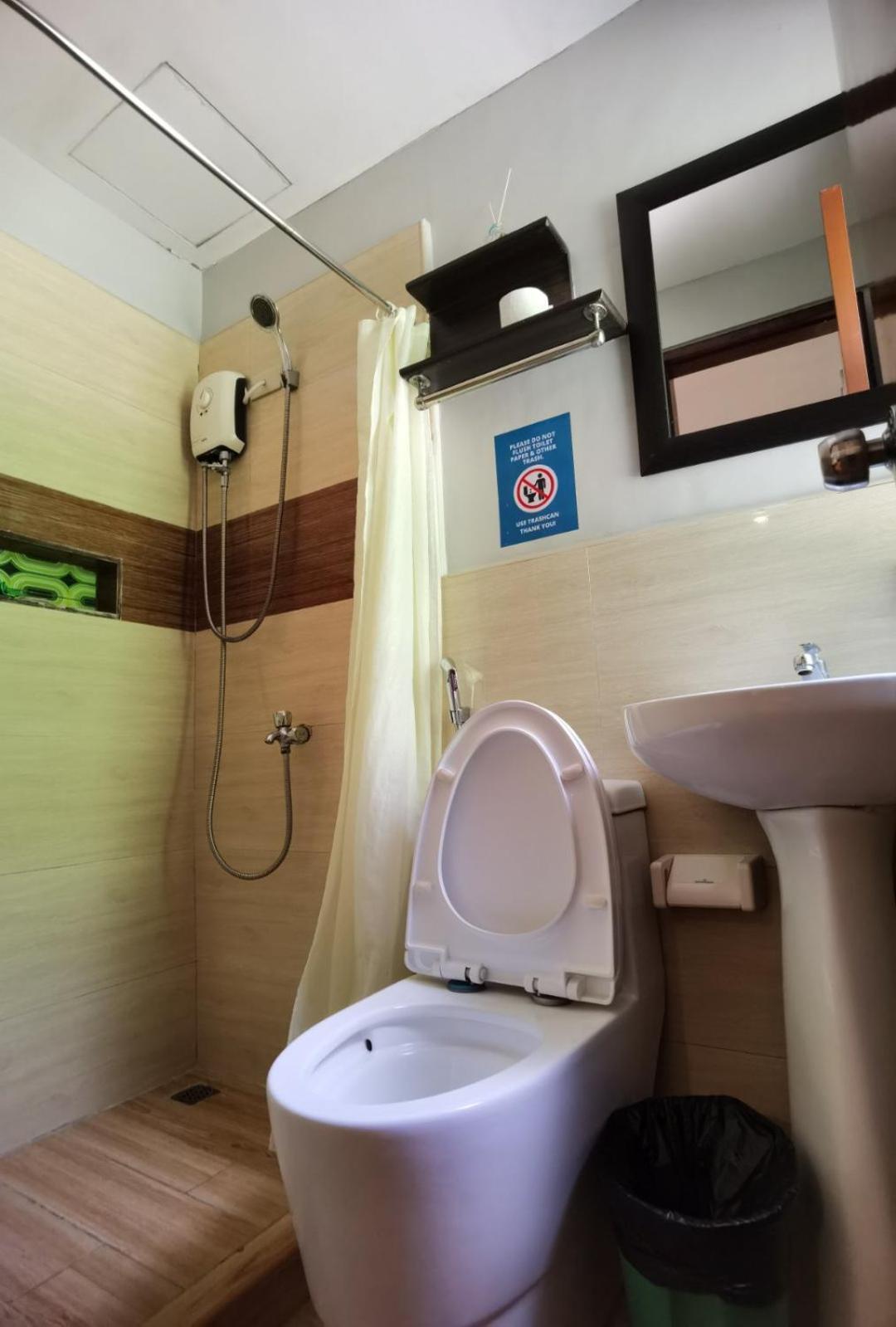 Amos Pili Tree Inn Powered By Cocotel Эль-Нидо Номер фото