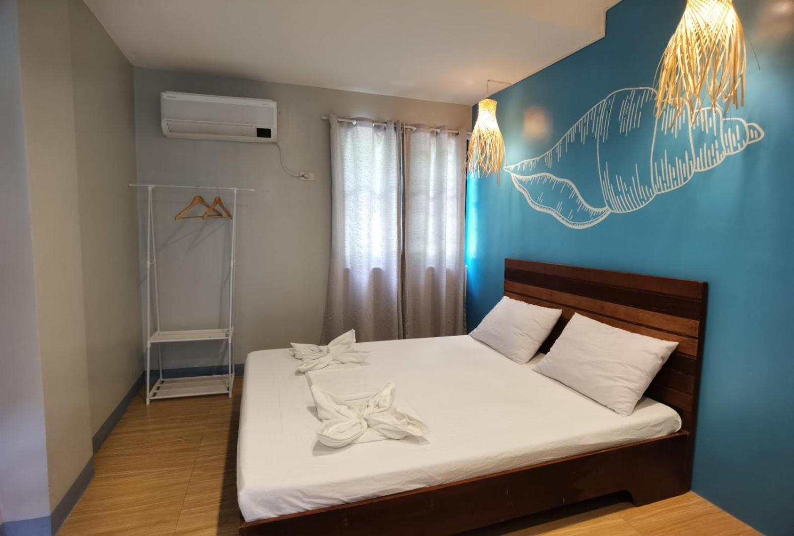 Amos Pili Tree Inn Powered By Cocotel Эль-Нидо Номер фото