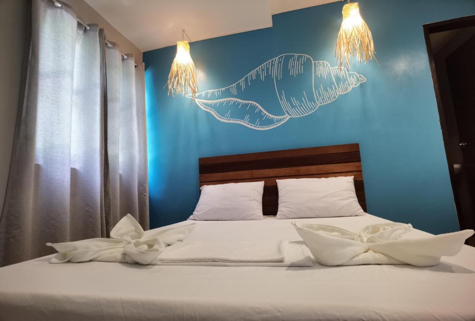 Amos Pili Tree Inn Powered By Cocotel Эль-Нидо Номер фото