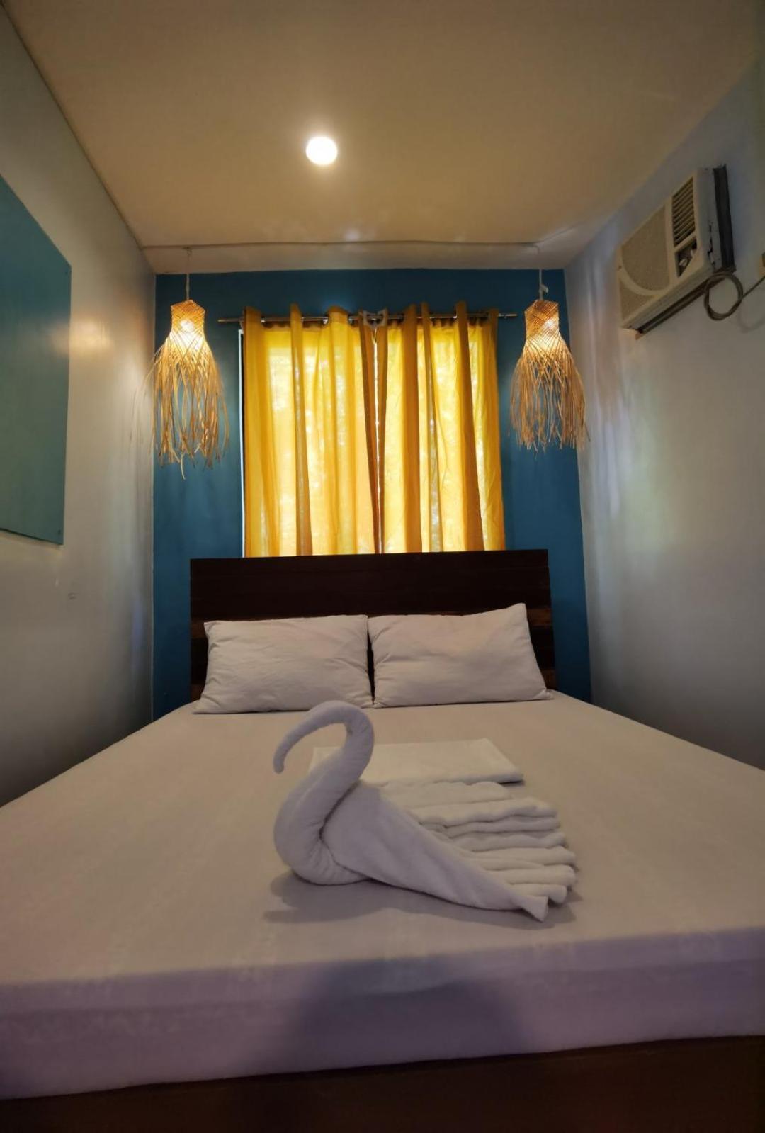 Amos Pili Tree Inn Powered By Cocotel Эль-Нидо Номер фото