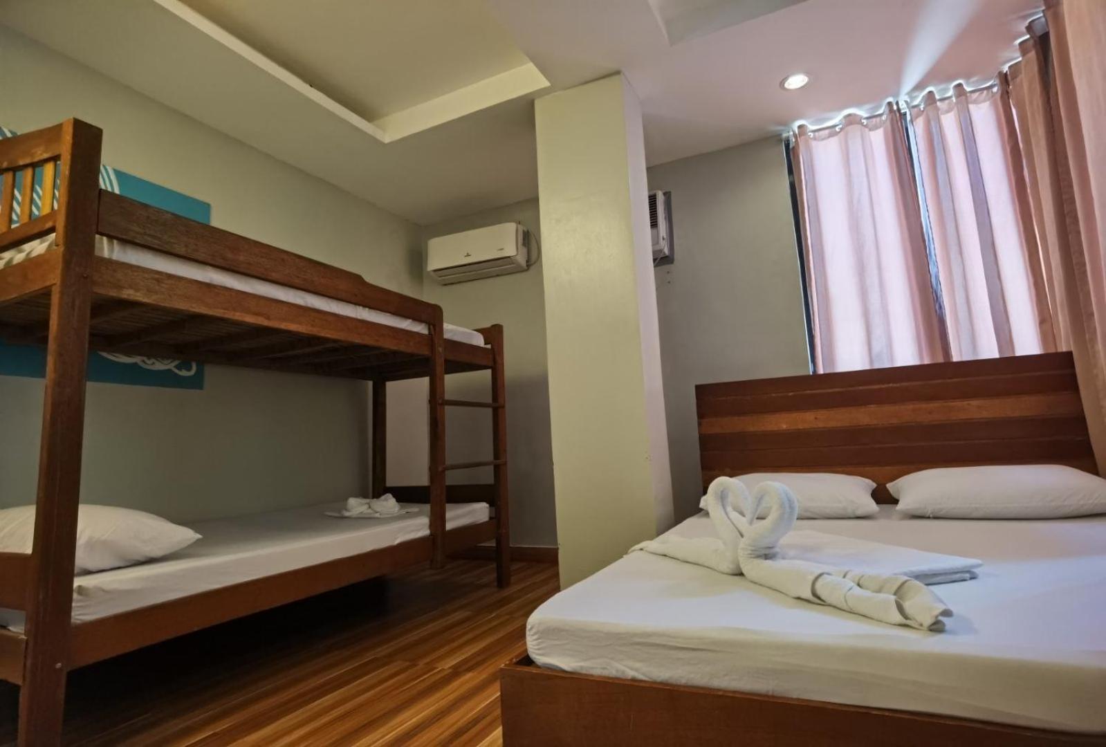 Amos Pili Tree Inn Powered By Cocotel Эль-Нидо Номер фото