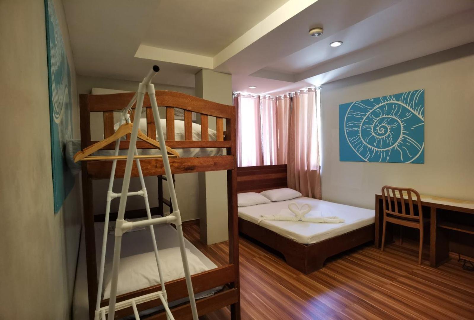 Amos Pili Tree Inn Powered By Cocotel Эль-Нидо Номер фото