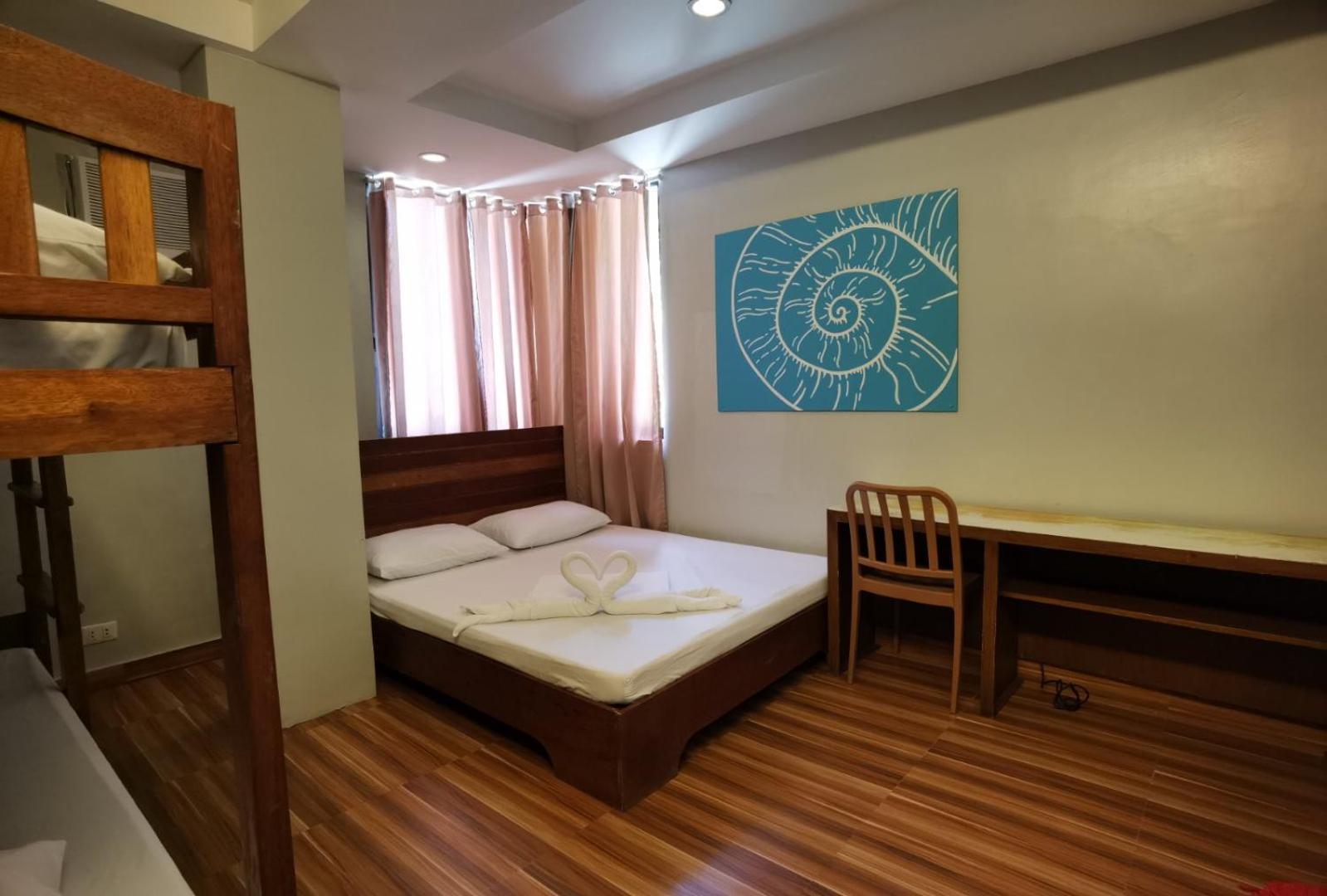 Amos Pili Tree Inn Powered By Cocotel Эль-Нидо Номер фото